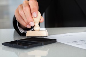 Business Man Hand With Rubber Stamp